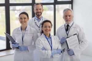 medium-shot-scientists-posing-together